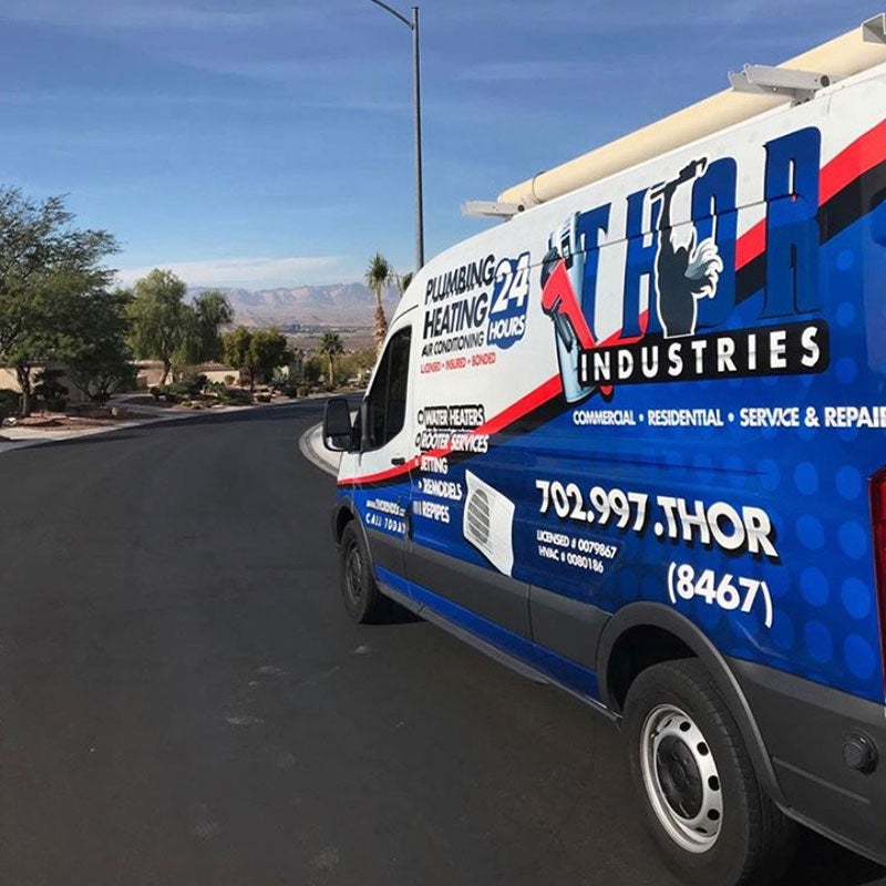 THOR Industries Plumbing & HVAC service van with bold 24/7 branding.