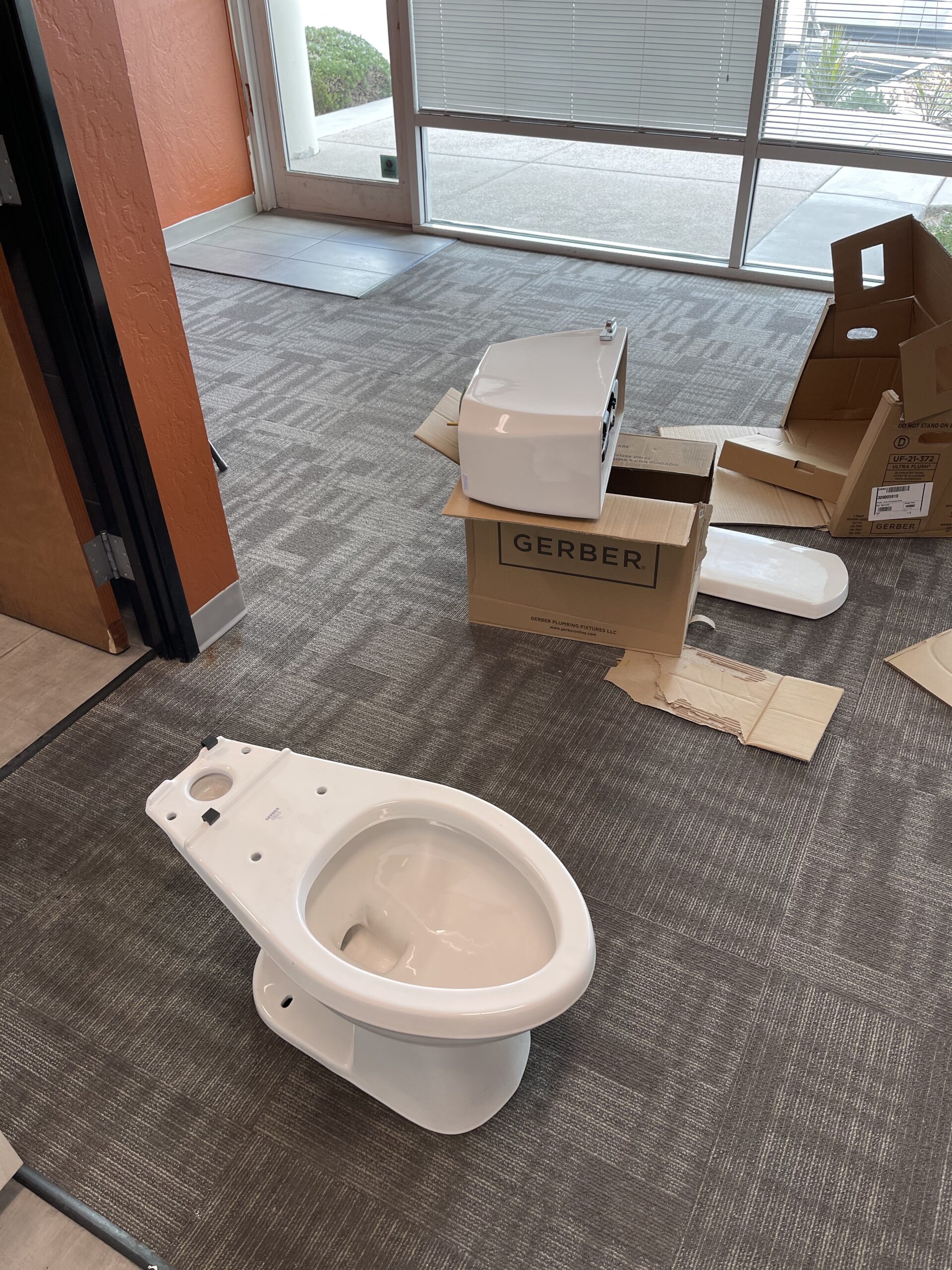 Bidet seat components and packaging in an indoor setting